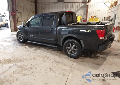 2015 Nissan Titan Pro-4X z USA, uszkodzony, nr VIN 1N6BA0EC7FN504238